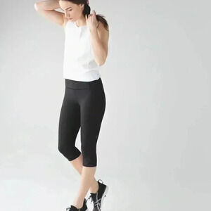 Lululemon Tight Stuff Crop with camo mesh detail black 27" 6